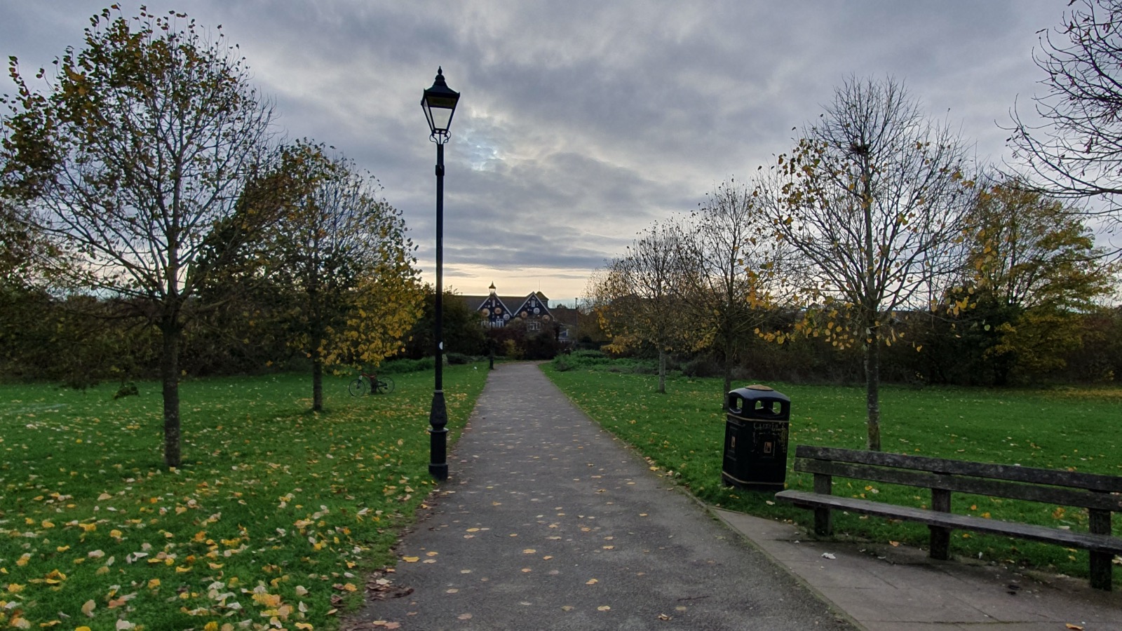 Wide grassy expanse of Pingle Playing Fields looking towards Pingle Drive in Bicester, photographed in November 2022.